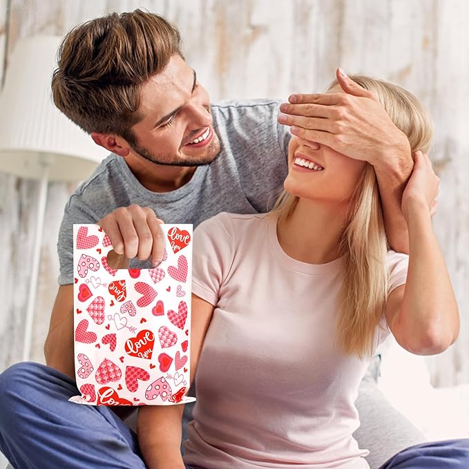 Hxezoc 50 Pieces Valentines Day Gift Bags with Handle, Plastic Treat Candy Bag Heart Goodie Treat Bags for Valentine's Day Anniversary, Baby Showers Birthday Party Supplies