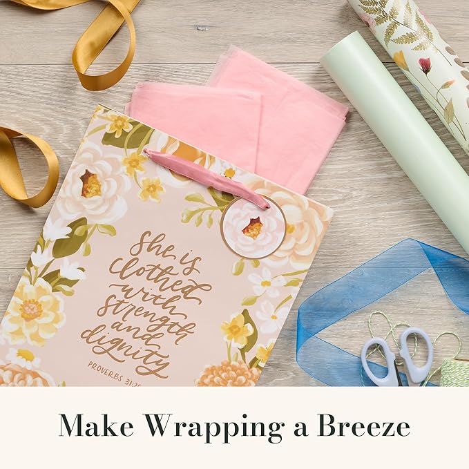 Christian Art Gifts Large Portrait Inspirational Scripture Gift Bag, Tag & Wrapping Tissue Paper Set for Women: Strength & Dignity Encouraging Bible Verse, Satin Ribbon Handles, Pink Multicolor Floral