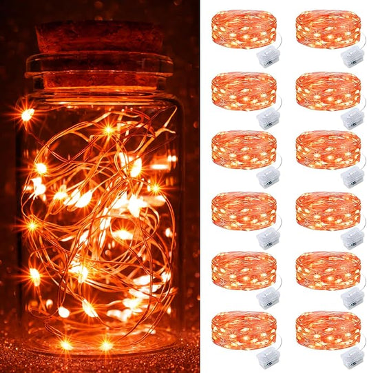 pozzolanas 12 Pack Orange Fairy Lights Battery Operated 3 Modes 7FT 20 LED Waterproof String Lights Twinkle Silver Wire for Mason Jars Wedding Christmas Halloween Party Decor (12, Orange)