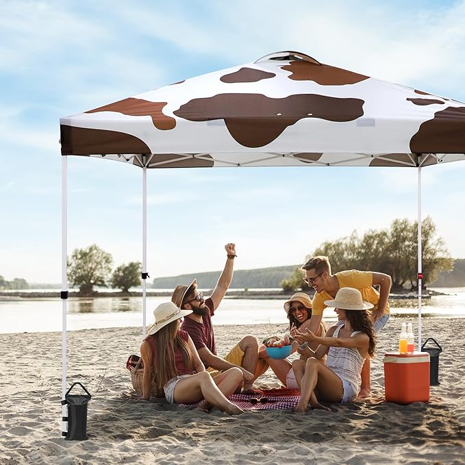 EAGLE PEAK Pop Up Canopy Tent with Wheeled Carry Bag, 8 Stakes, 4 Ropes, 4 Weight Bags, Easy Set Up Tent Canopy, 10x10 ft, 100sqft of Shade, Brown Cow Print